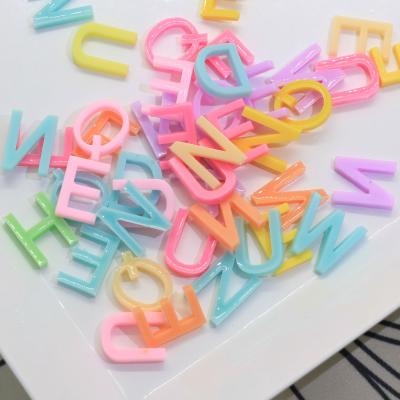 China Hottest fashion acrylic 10*15mm letter form various color and shape alphabet cartoon acrylic resin bead for handmade decoration for sale