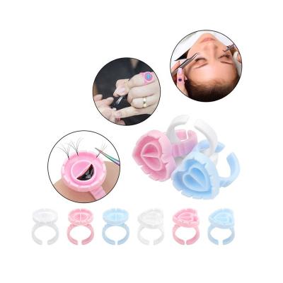 China Eyelash Extensions Salon Supplies Flower Plastic Cup Eyelash Lash Extensions Tools OEM Glue Holder Heart Shaped Glue Rings for sale