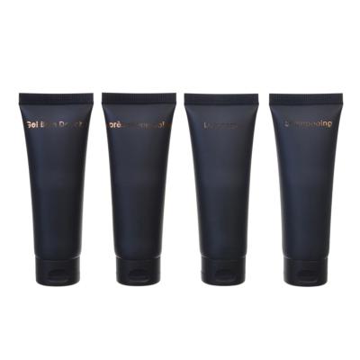 China Black Cosmetic Soft Tube Plastic Lotion Cream Squeeze Packaging Tube Cosmetic Travel Lotion Cream Tube With Flip Lid for sale