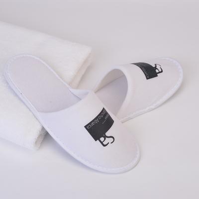 China Exquisite Disposable Hotel Amenities Customized Disposable Embroidered Hotel Bathroom Terry Slippers For Sale for sale