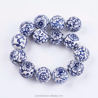 China Ceramic Pandahall 24~27mm Round Handmade Blue And White Porcelain Beads for sale