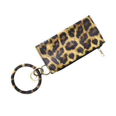 China Anti-theft Key Ring Holder Wristlet Leather Bangle Mini Clutch Wallet Personalized Fashion PU Leather Bag for sale