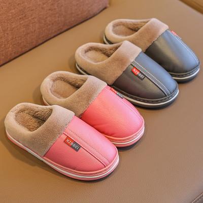 China Indoor Warm Kids Baby Boys PU Leather Autumn Winter Non Slip Waterproof Women's Home Unisex/Unisex Kids Cotton Slippers for sale