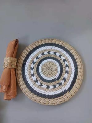 China Hot Sale Eco- friendly Handmade Natural Water Hyacinth Woven Table Placemat Seagrass Rattan Straw Placemats for sale