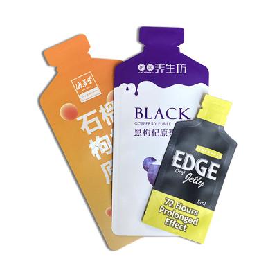 China Barrier energy gel pouch cosmetic bag 3 side seal aluminum foil energy gel bag sample bottle shape plastic sachet cream sachet shape serum sample for sale