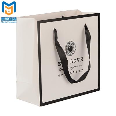 China 2021 Recyclable Wholesale Custom Printed Your Own Logo Paper Gift Bag Luxury Paper Bag For Shopping for sale