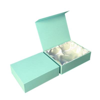 China Custom Materials Gift Packaging Recycled Collapsible Magnetic Gift Box With Ribbon Sealing Wig Packaging Box for sale