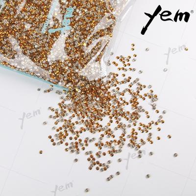 China Environment Inspection Yem 42 Bags/Fix Flatback Hot Sale 5mm Hotfix Cardboard Stone Hot Transparent UV Gold Bulk Resin Rhinestone For Clothes for sale