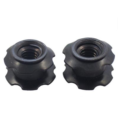 China Automotive Industry M8 X Black Steel Oxide 20 Flower Threaded Star Button Insert Nut for sale