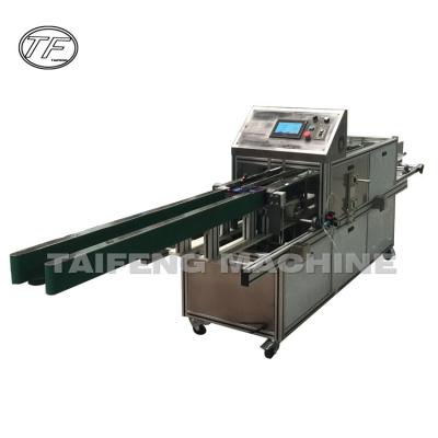 China Semi-automatic cardboard box facial tissue paper packing machine for sale