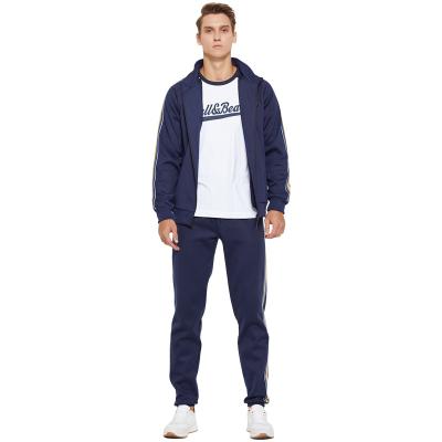 China Breathable newest hot sale casual 100% polyester men s sweatsuit tracksuits for men with stripe in navy gym tracksuit for sale