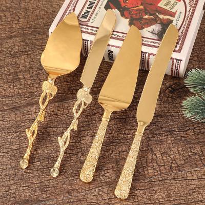 China Sustainable Creative Pattern Pizza Shovel Set Exquisite Retro Metal Table Knife Handle Pizza Shovel With Cutter for sale