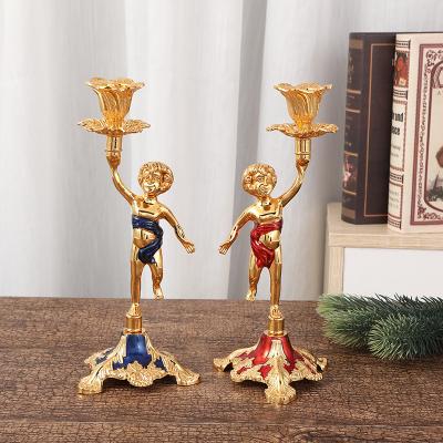 China Retro Hot Amazon Business Metal Candlestick Ornaments Home Decorative Candlestick Gold Vintage Candlestick Holder for sale