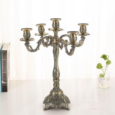 China Modern Luxury Retro Three Heads Five Heads Nordic Candlestick Stand Fancy Wedding Candlesticks Decoration for sale