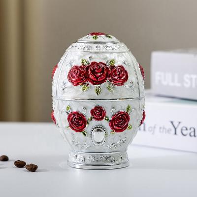 China Viable Creative Press Design Egg Toothpick Holder Alloy Toothpick Dispenser Flower Vase For Toothpick Bottle for sale