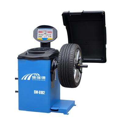 중국 SM-B182 Auto Tire Balancer Machine With Foot Brake Cars Motorcycle SUV Tire Rubber Cover Modes 990*760*1150mm 판매용