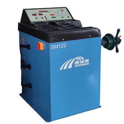 중국 Cheap price SM-122 wheel balancer machine computer balancer with rubber cover 930*710*1160 mm 판매용