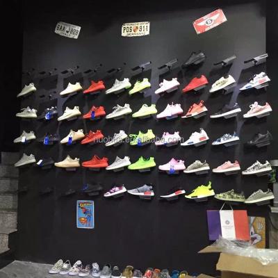 China Huohua cheap hot sale environment friendly metal install on the wall retail shoe store display furniture for sale