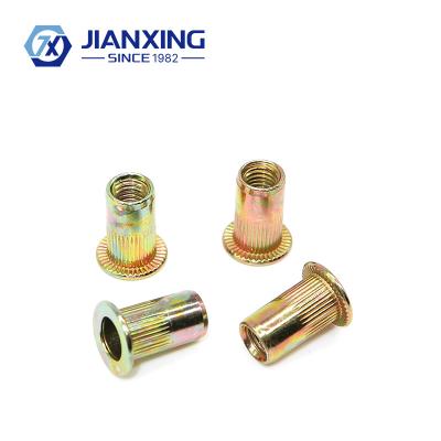 China Galvanized Heavy Industry Carbon Steel Blind Knurled Flat Head Rivet Nut for sale