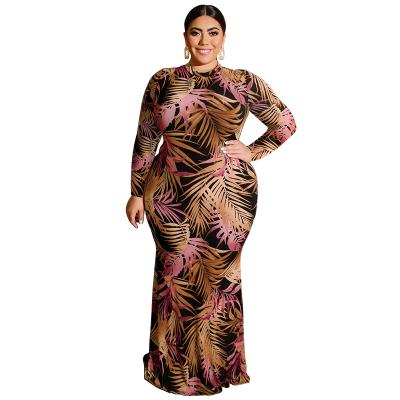 China Breathable Women's Autumn And Winter Plus Size Leaf Printed Leaf Neck Dress Round Waist Bodycon Hollow Long Sleeve Maxi Dress for sale