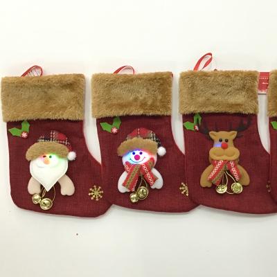 China Santa Factory Directly Sale Unique Decoration Christmas Stocking Jars Christmas Item Type Christmas Stocking With Led Lights for sale