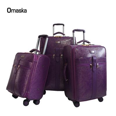 China PU OMASKA Manufactures Purple Color 4 Wheel Double Wheel Travel Suitcase Trolley Luggage for sale