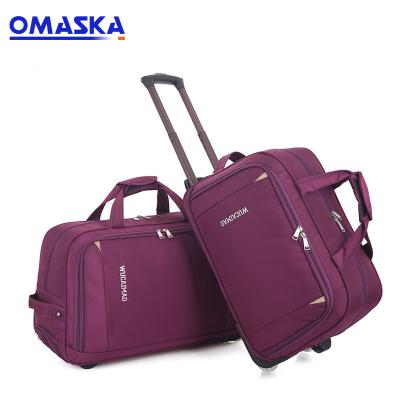 China Fashion Purple Color Leisure Nylon Material Durable Wheel Style Sport Trolley Duffel Bag for sale