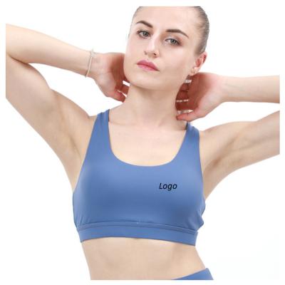 China Breathable yoga women's cross-back sports vest top gym current active culture solid color fashion bra sports bra fitness and yoga wear for sale