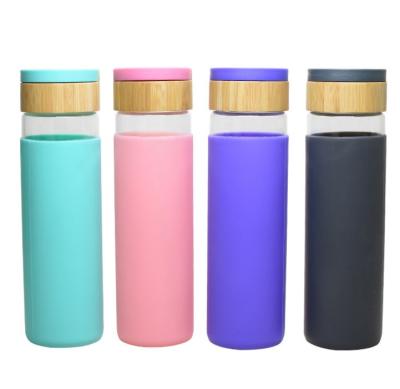 China Sustainable Eco Friendly Biodegradable Silicone Sleeve Gym 500ml Glass Water Bottle With Bamboo Lid for sale