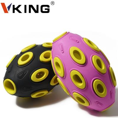 China Durable Double Layer Rugby Ball With Bell Light Durability Shaping Interactive Puzzle Treat Pet Toys Rubber Dog Ball for sale