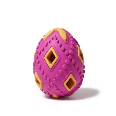 China Natural Rubber Durable Goods Dog Toys Pet Maker Teeth Grinding Dog Chew Toys Pink Two Colors With Yellow Color Egg for sale