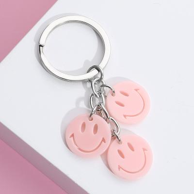 China Plastic Cute Bag Ornaments Smile Face Key Chain Acrylic Key Ring for sale