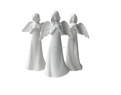 China Custom Made Europe Porcelain Angel Sculpture Figurines Ceramic Ornament Angel Figurines For Office Decoration for sale