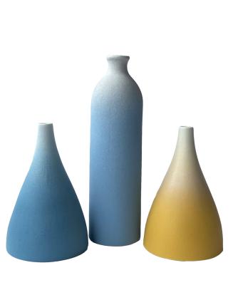 China Nordic Europe style frosted blue and yellow ceramic vases porcelain bottle ornament for home decoration for sale