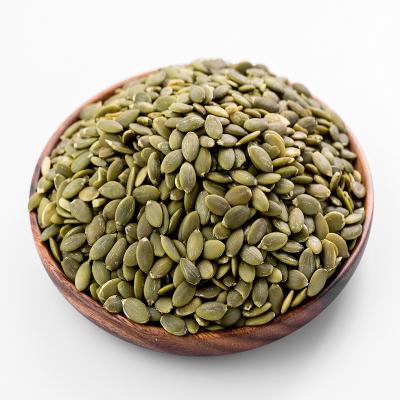 China Xinjiang dry origin by the plant possessed skin shine AA pumpkin seed kernels for sale