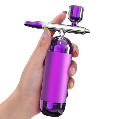 China Skin Tightening Wireless Multi Functional Kit Portable Air Brush Set Art Painting Oxygen Injector Biumart Mini Spray Pump Pen Air Compressor for sale