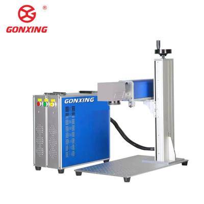 China Garment Shops Benefit from 3D Fiber 2D Workbench Table Laser Printing Machine with Water Cooling Power Tunability 10 to 100% for sale