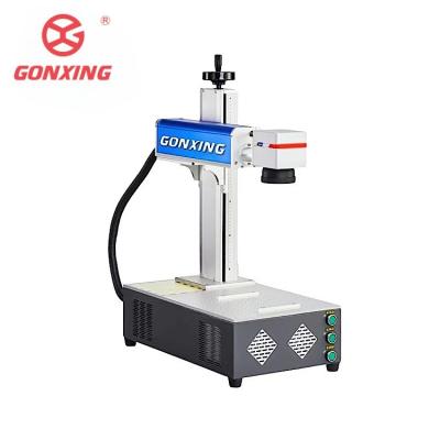 China Air-cooled GONXING LASER Portable Fiber Laser Marking Machine 20w 30w 50w 60w 70w 80w 100w 120w 200w for Pen or Rings Easy for sale