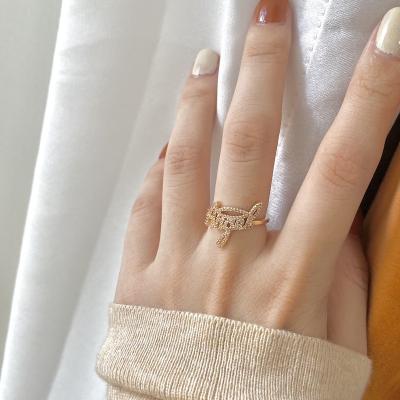 China Fashionable High Quality 14K Gold Plated Iced Gold Angle Letter Pave Rhinestone Ring for sale