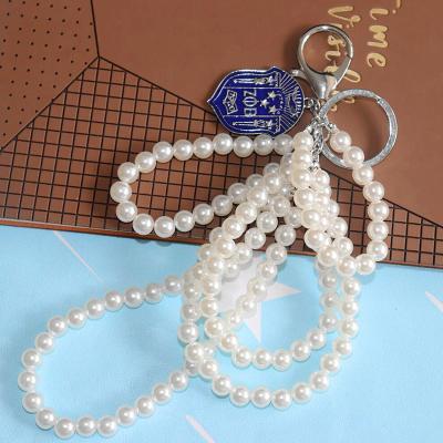 China Eco-Friendly Women Bag To Decorate Zeta Phi Beta Shield Pendant Layers Pearl Elegant Greek Sorority Letter Key Chain Key Chains for sale