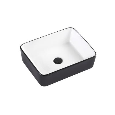 China Modern Cabinet bathroom sink for the hotel supplier rectangular porcelain basin table basin customized modern China for sale