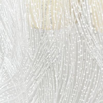 China Breathable Factory Professional irregular pattern sliver sequin embroidery mesh fabric for dress for sale