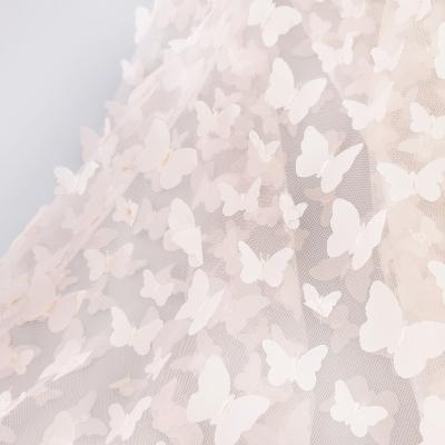 China Breathable French elegant handmade sequined butterfly beaded lace wedding dress mesh fabric for sale