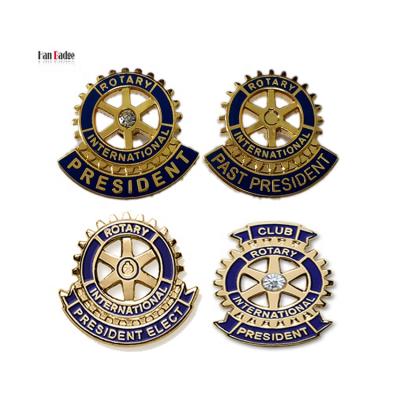 China Custom Europe Rotary International President Pin Hard Enamel Lapel Badge Die Cut in 24K Gold Plating for sale