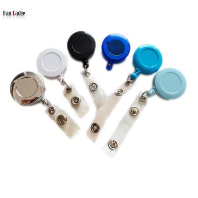 China Custom Logo Round Shape Plastic Retractable Pull Badge Reel With Metal Clip Back for sale