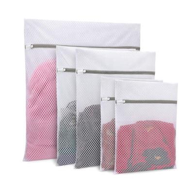 China Microplastic Sock Minimalist Wholesale Nylon Underwear Net Bag Travel Supply Bag Mesh Wash Net Bag for sale