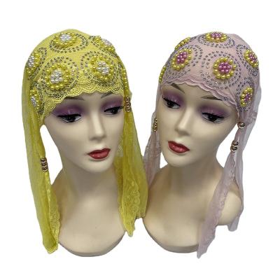 China Fashion New Fashion Lace Turban Hat Muslim Scarf Women Beads Hijab Hat Ball Shaped Hat With Ribbon for sale