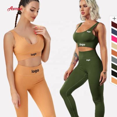 China Fashion Antibacterial Women Gym Clothing Set Two Piece Butt Lift Up Yoga Leggings And Seamless Bra Set for sale