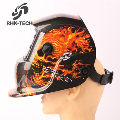 China RHK TECH Factory Anti Fire Skull Design Popular Decals Stickers Solar Powered Auto Darkening Welding Helmet 24.5*18*31cm for sale