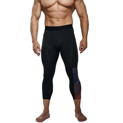 China Anti-wrinkle Cheap factory price black tight pants sports 3/4 compression pants tights men running skin tight pants for sale